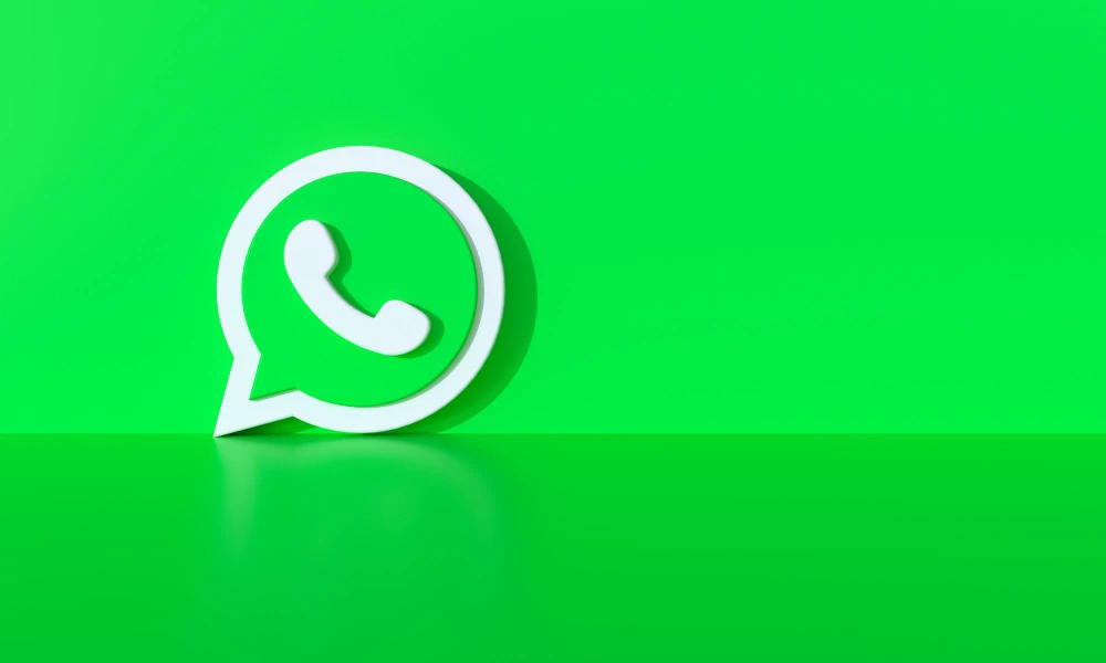 A minimalist image of the WhatsApp logo on a bright green background, symbolizing the communication and connection facilitated by WhatsApp communities, enhanced through KYG’s comprehensive management tools.