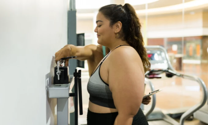 woman on the weights