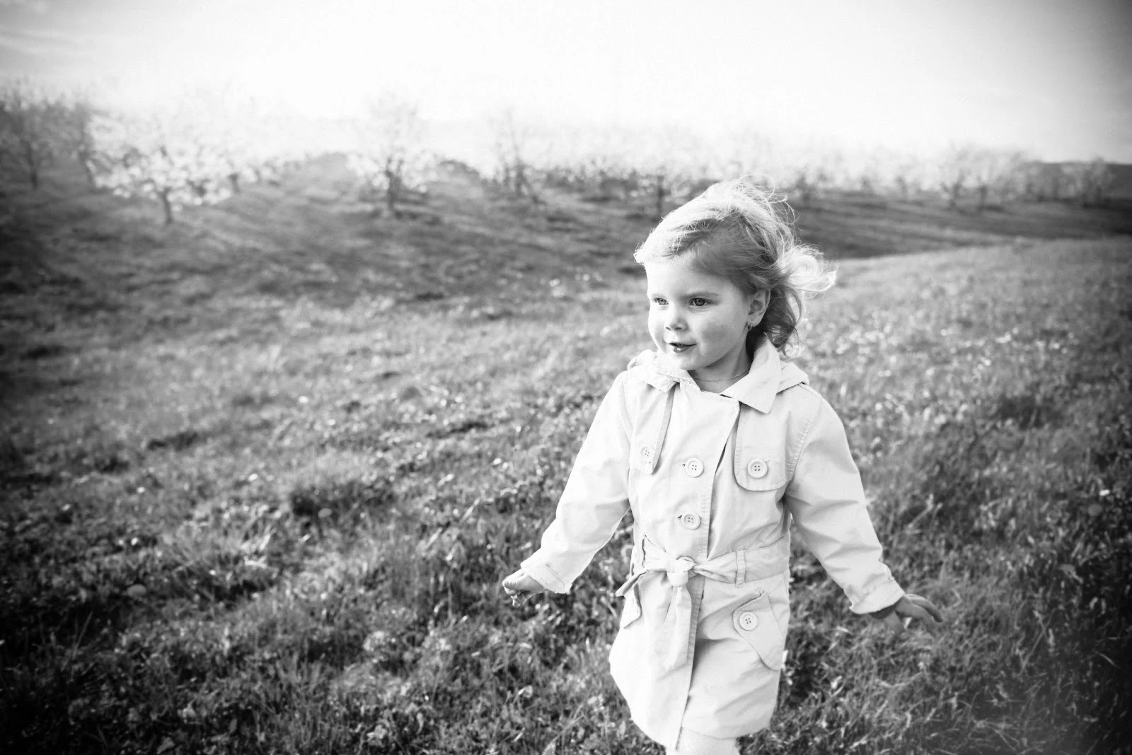 toddler running through field
