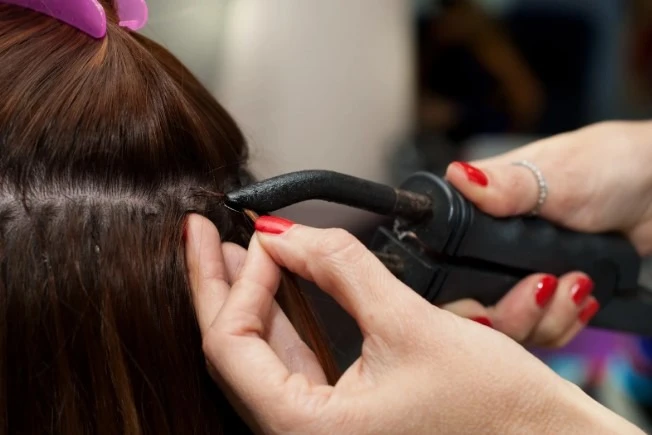 how often should hair extensions be removed