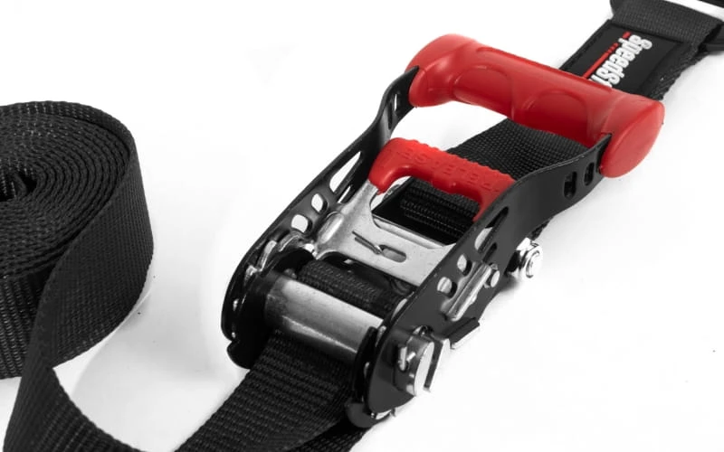 Храповий механізм для стяжного ременя