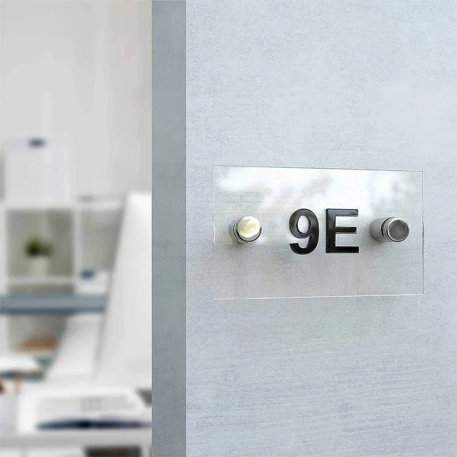 modern acrylic office door sign with room number 9E, minimalist interior signage