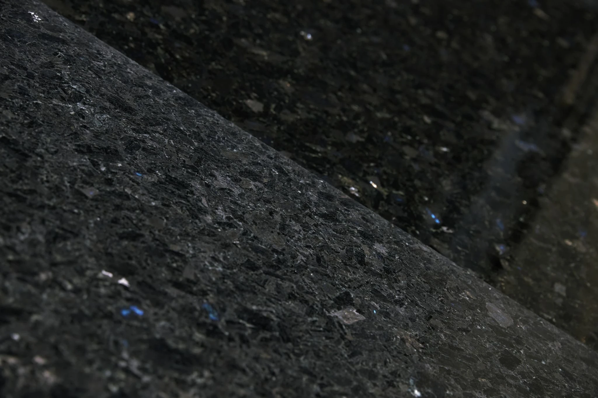 Two Volga Blue granite slabs for comparison.