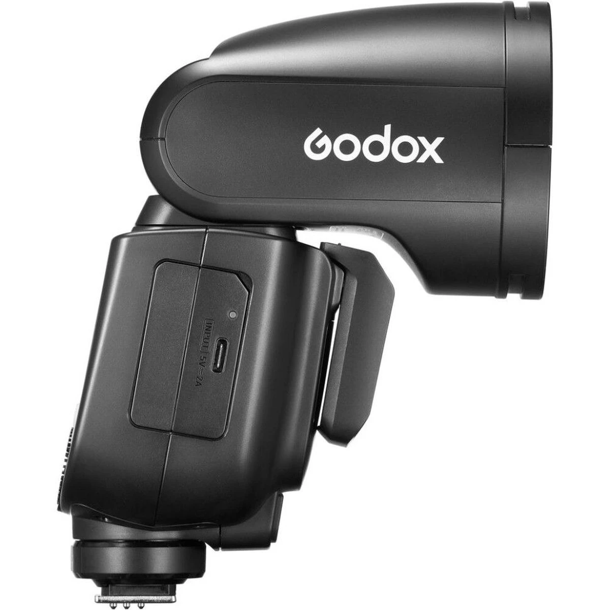 Спалах Godox V1Pro у профіль зі встановленим суб-спалахом SU-1 та відсіком акумулятора VB30 з портом USB-C | підпис: Знімний модуль SU-1 додає пряме заповнююче світло під час роботи основним променем на відбиття.