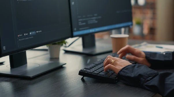 Understand the B2B partnership model with a b2b igaming provider like Soft2Bet Specialist at a computer reviewing a partnership with a b2b igaming provider
