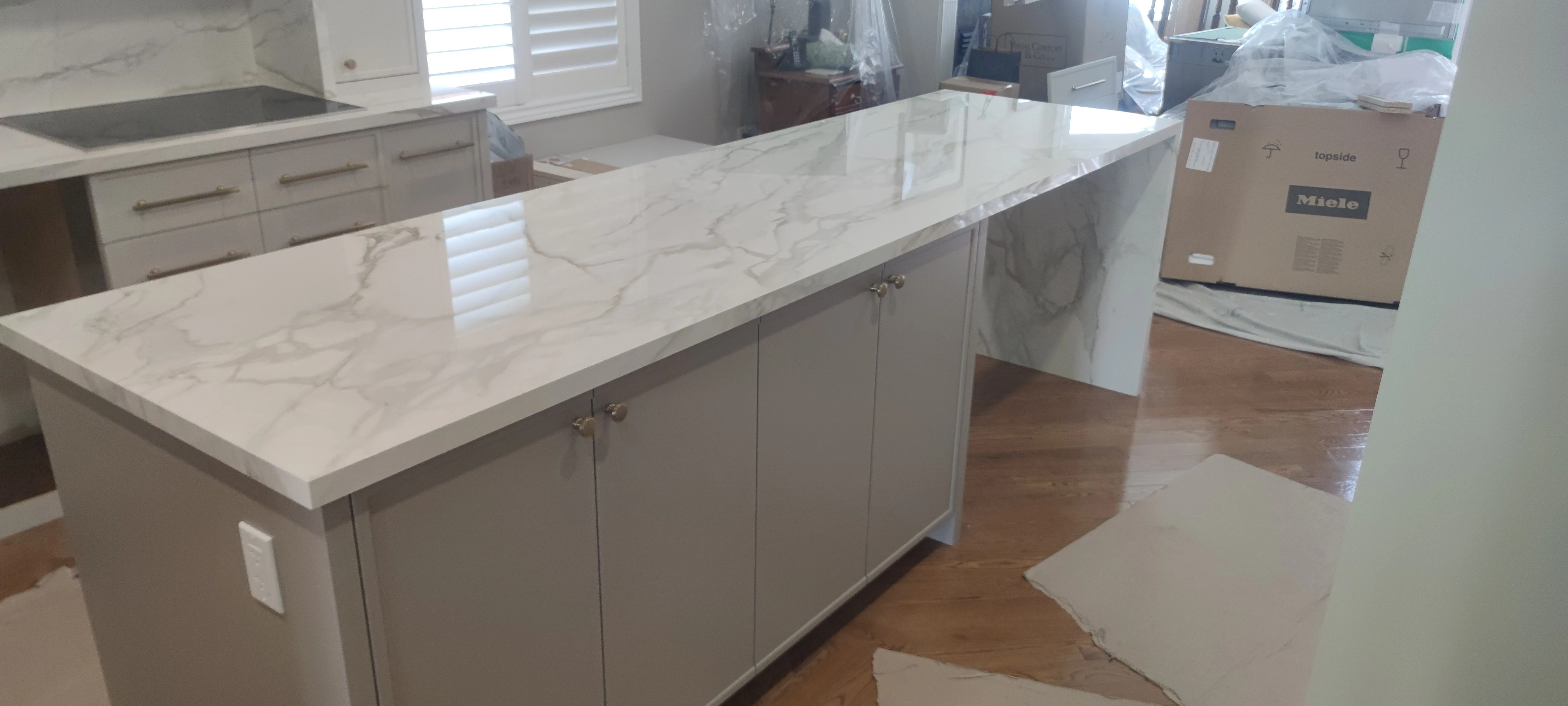 White quartz kitchen countertop with undermount sink